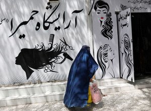 Illustration depicting Taliban restrictions on Afghan women's rights - Global Banking & Finance Review