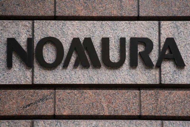 Image for Nomura flags $2 billion loss, cancels bond issue; shares plummet
