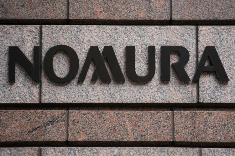 Nomura flags $2 billion loss, cancels bond issue; shares plummet