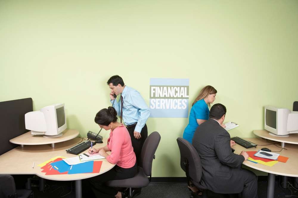 Small business owner securing online data with cybersecurity strategies - Global Banking & Finance Review