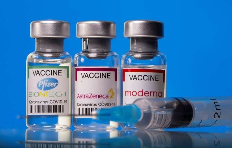 Illustration of COVID-19 vaccine vials from Pfizer, AstraZeneca, and Moderna - Global Banking & Finance Review