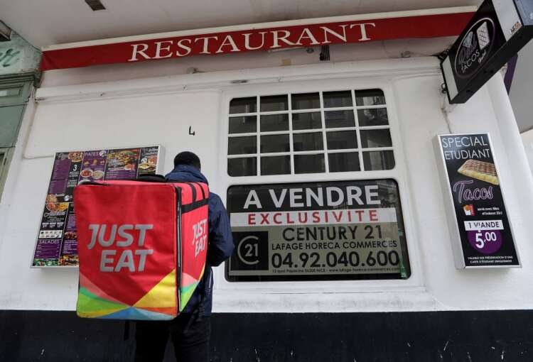 Image for Just Eat Takeaway shares leap 10% on forecast of underlying profit