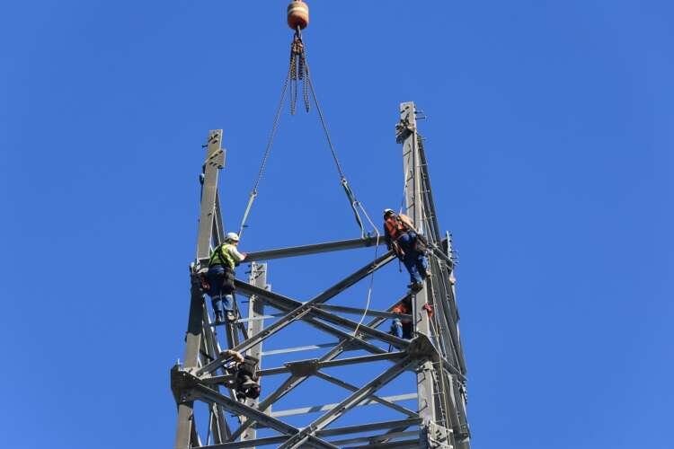Workers constructing a high-voltage power line for Amprion in Germany - Global Banking & Finance Review