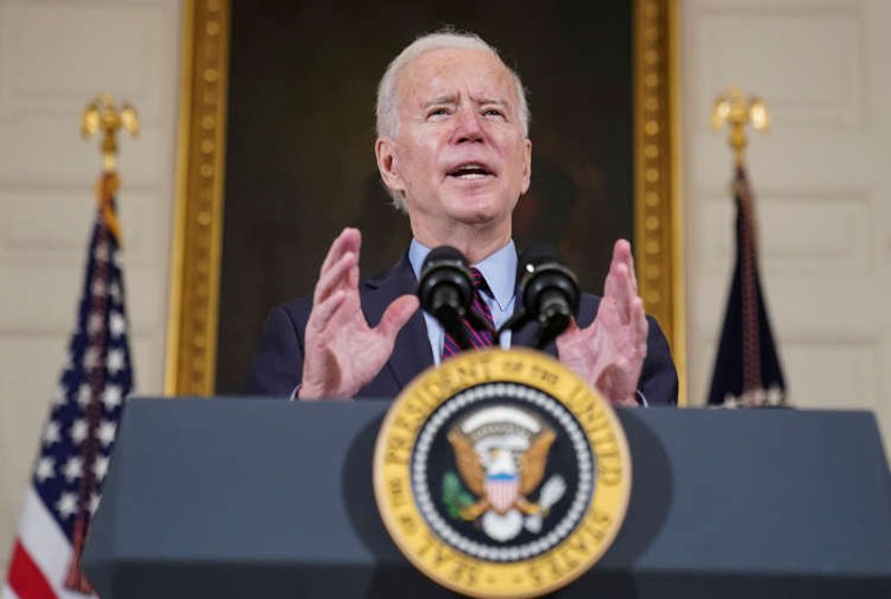 Image for Urging vigilance, somber Biden tells U.S. states to speed up vaccinations