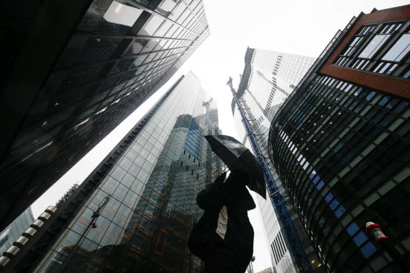 Image for Factbox-Companies cut jobs, freeze hiring to prepare for economic slowdown