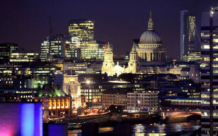 St Paul’s Cathedral against the backdrop of London's financial district at dusk - Global Banking & Finance Review