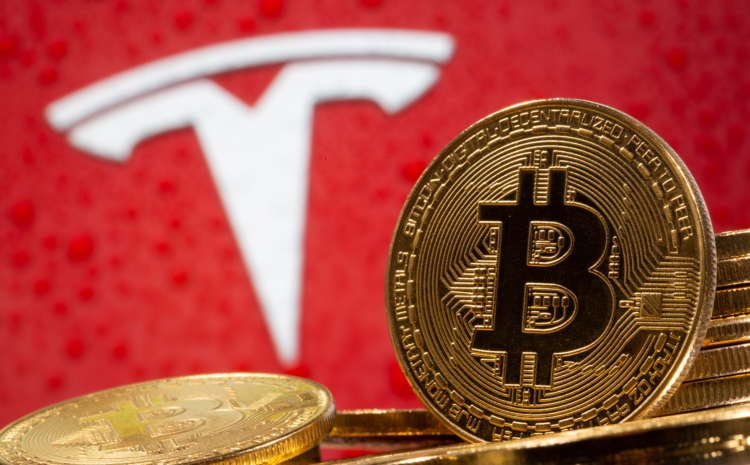 Bitcoin symbols next to Tesla logo, illustrating cryptocurrency's impact on finance - Global Banking & Finance Review