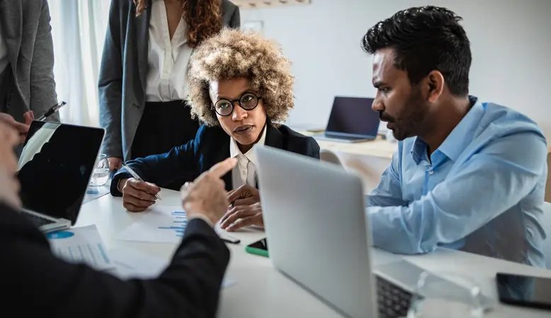 Business leaders strategizing for better decision-making in finance - Global Banking & Finance Review