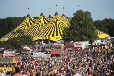 Image for Thousands descend on UK music festival amid rise in COVID cases