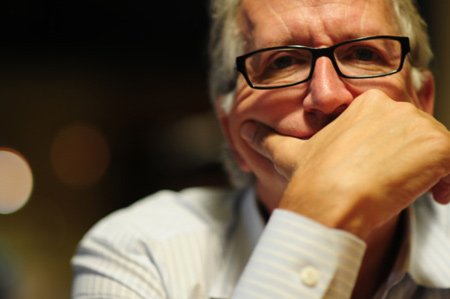 Worried business owner reflecting on cyber-attacks affecting SMEs - Global Banking & Finance Review