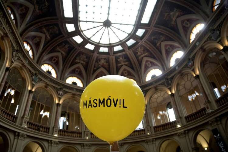 A MasMovil logo balloon in Madrid, representing the telecom merger with Orange - Global Banking & Finance Review
