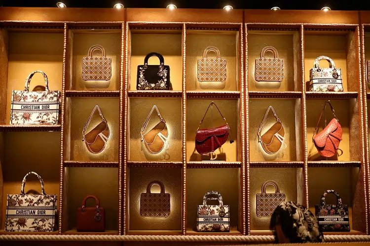 Luxury goods display featuring lower-priced items for middle-class shoppers - Global Banking & Finance Review
