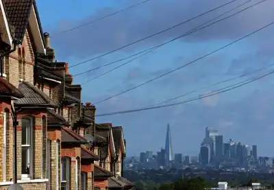 Image for UK house prices hit record high but rise by least in 3 months, Halifax says
