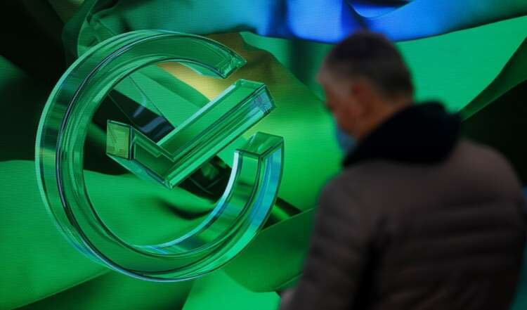 The logo is on display in an office of the Russian largest lender Sberbank in Moscow