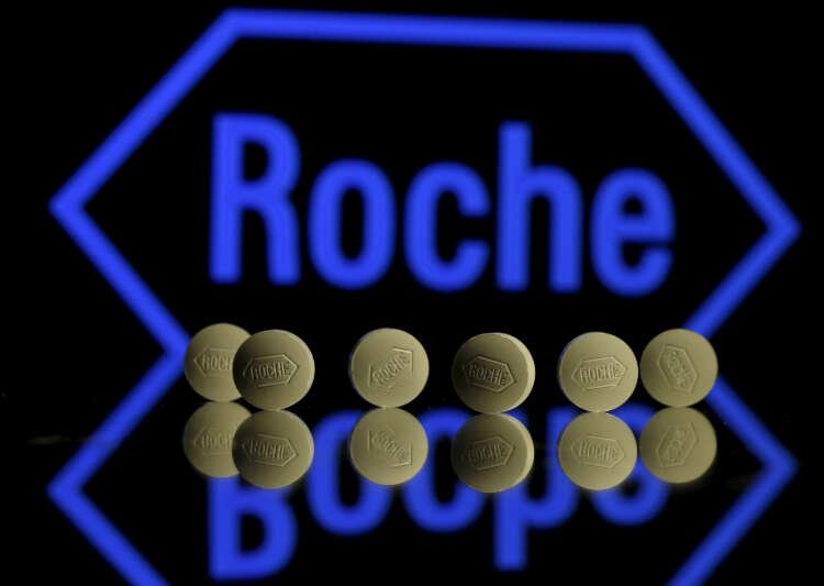 Roche logo with tablets illustrating the company's earnings decline in COVID products - Global Banking & Finance Review