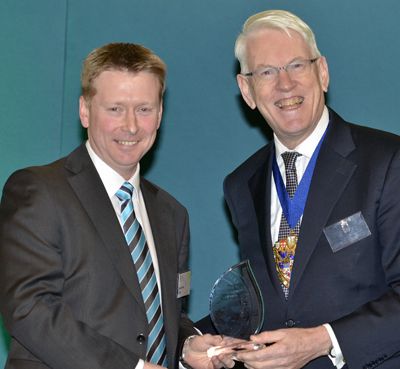 Darren Kelly ACSI of Isle of Man receiving his award from Sir David Howard FCSI(Hon), Chairman and Managing Director, Charles Stanley & Co Ltd.