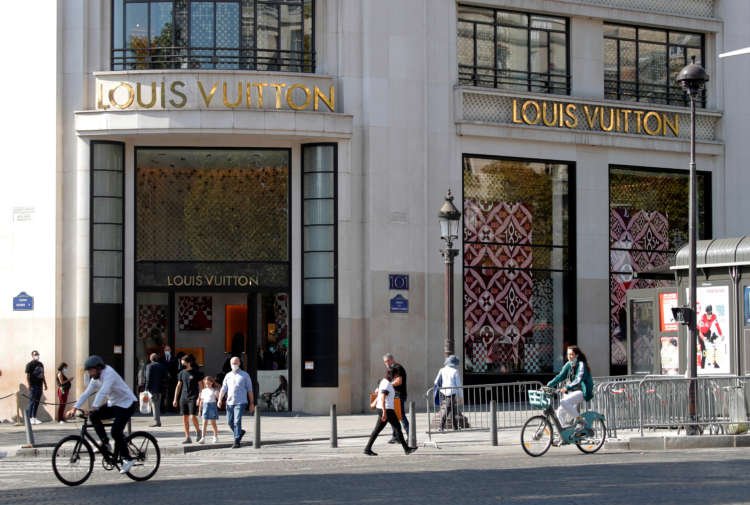 Louis Vuitton store in Paris showcasing luxury fashion amidst LVMH's sales growth - Global Banking & Finance Review