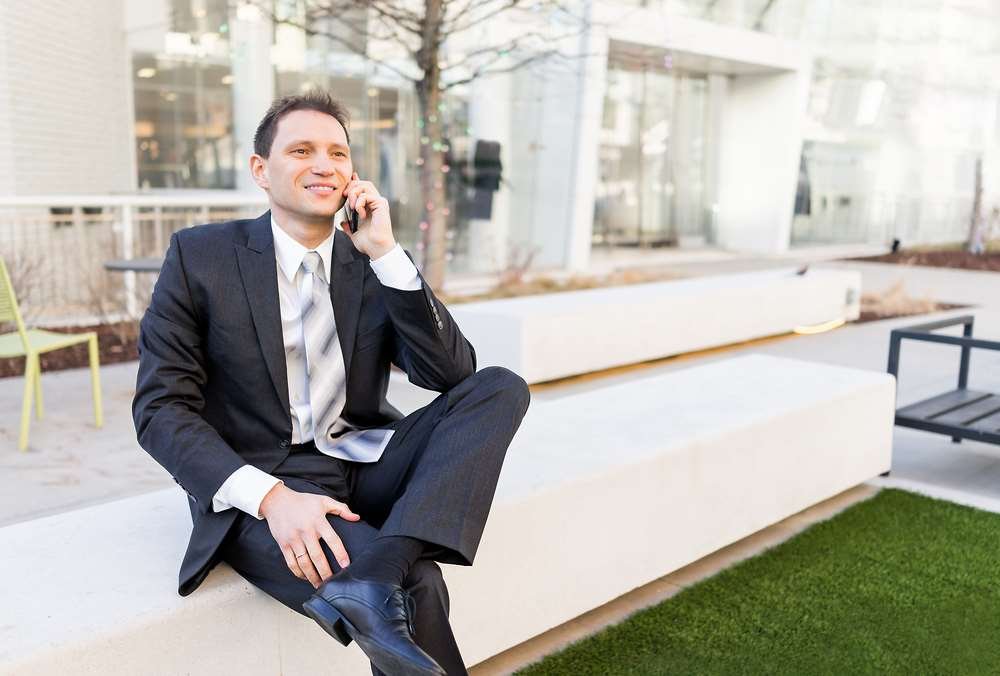 Professional candidate preparing for a phone interview in a focused setting - Global Banking & Finance Review