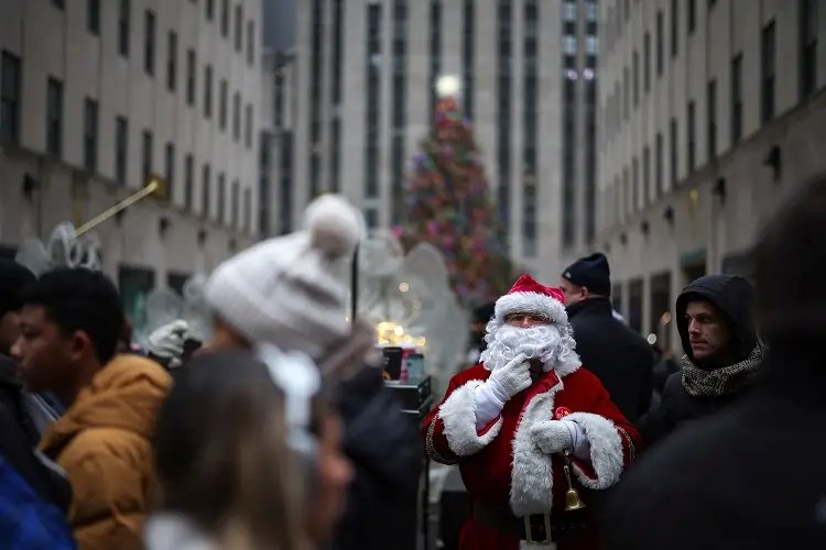 Santa Claus in a sleigh delivering presents on Christmas Eve - Global Banking & Finance Review