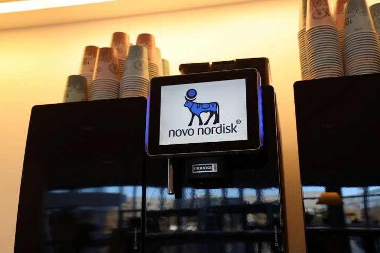 Novo Nordisk logo on a coffee machine at headquarters, reflecting the company's focus on obesity drugs - Global Banking & Finance Review