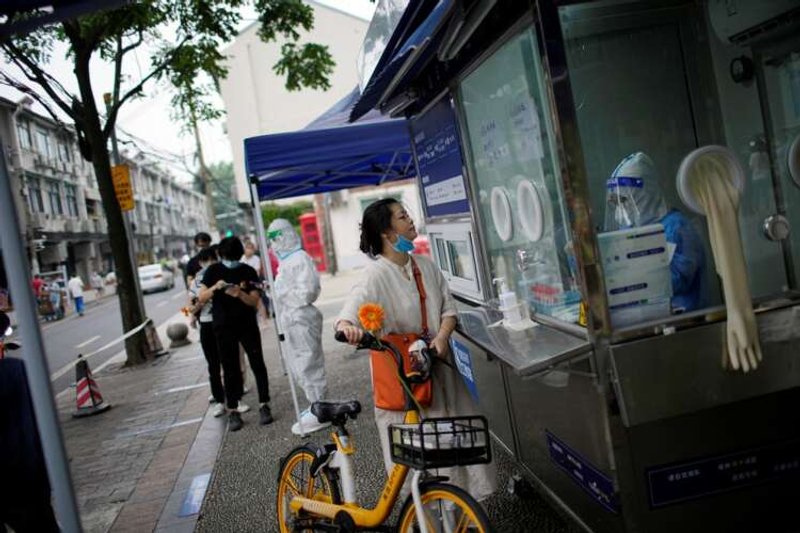 Image for In Shanghai, lockdown blues make way for COVID testing gripes