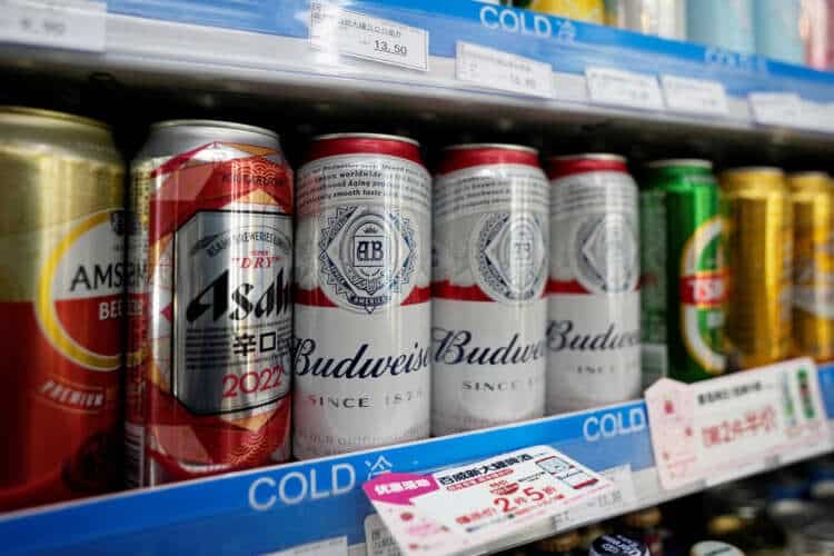 Cans of premium Budweiser beer on display, highlighting China’s post-COVID beer market recovery - Global Banking & Finance Review