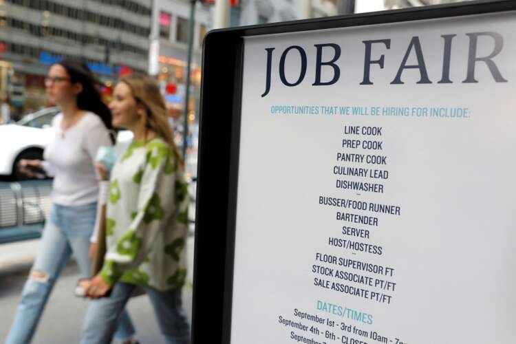 Job fair signage on 5th Avenue, symbolizing US employment growth - Global Banking & Finance Review