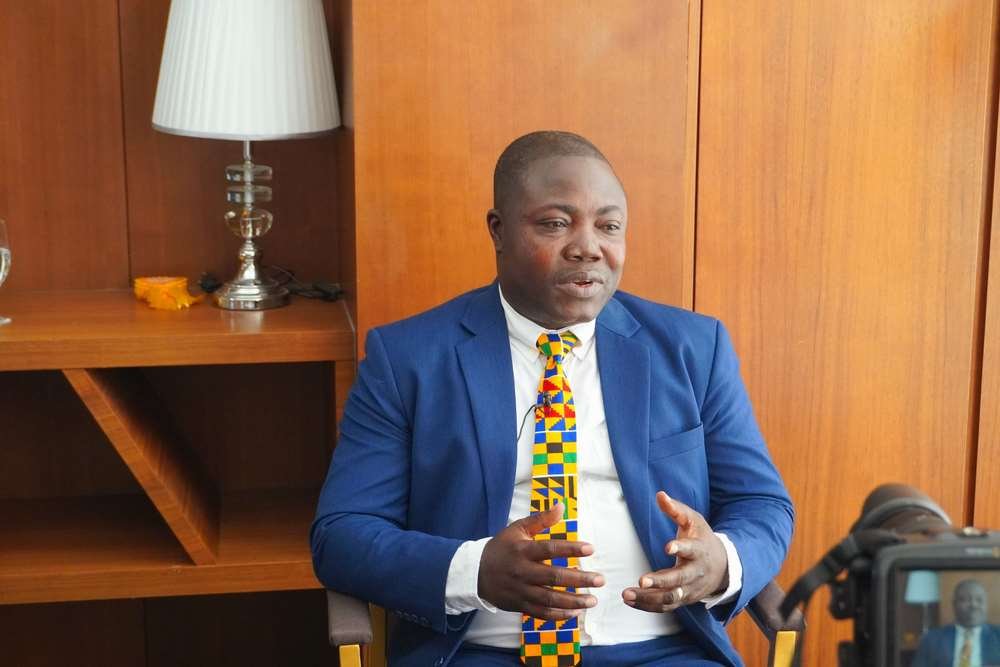 Mr. Siegfried Kofi Gbadago, Acting CEO of Hayman Capital, celebrating the Fastest Growing Microfinance Company award - Global Banking & Finance Review