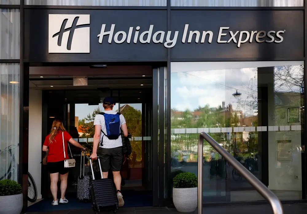 Holiday Inn hotel exterior showcasing leisure travel demand growth - Global Banking & Finance Review
