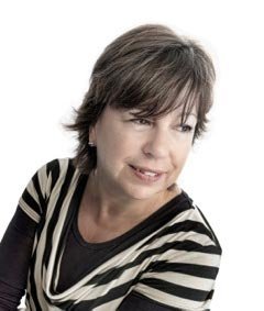 Professional portrait of Elaine Wilson discussing performance improvement strategies - Global Banking & Finance Review