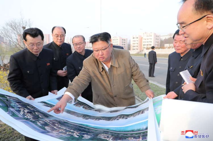 North Korean leader Kim Jong Un at a housing construction site - Global Banking & Finance Review