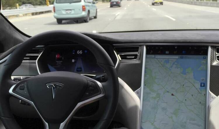FILE PHOTO: The interior of a Tesla Model S is shown in autopilot mode in San Francisco