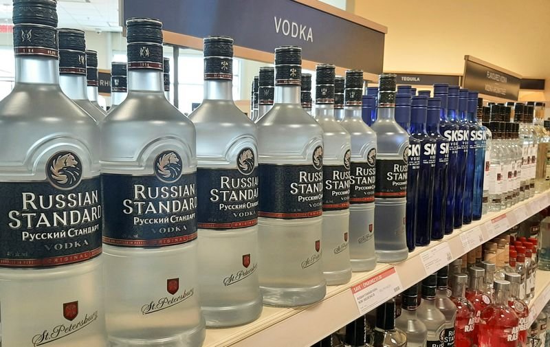 Vodka bottles with Russian Standard label, symbolizing Russia's foreign corporate holding issue - Global Banking & Finance Review