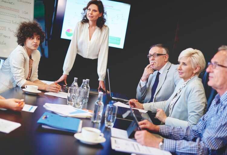 Business woman leading a discussion on succession planning strategies - Global Banking & Finance Review