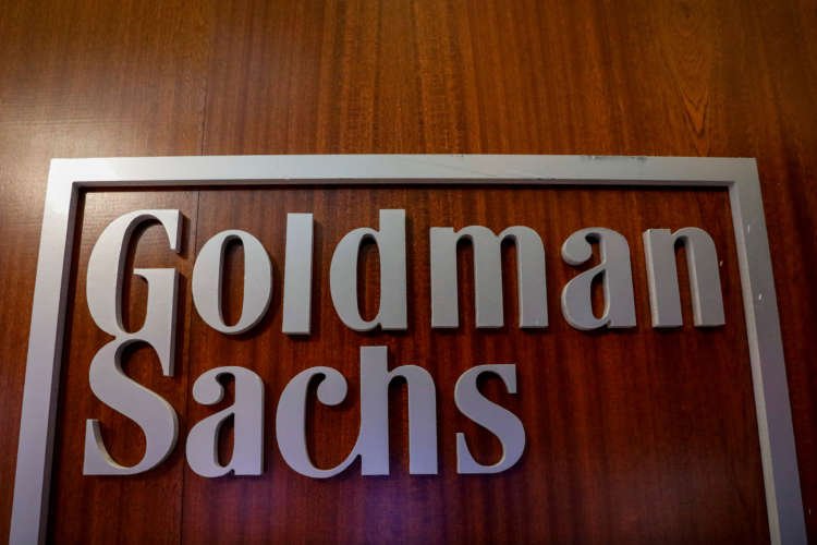 Goldman Sachs logo in New York office, reflecting return to work strategy - Global Banking & Finance Review