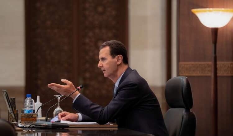 Syria’s President Bashar al-Assad meets with the Syrian cabinet in Damascus