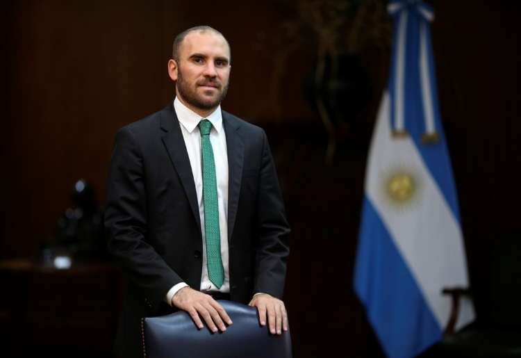 Argentina’s economy minister heads to Europe to woo finance officials over debts