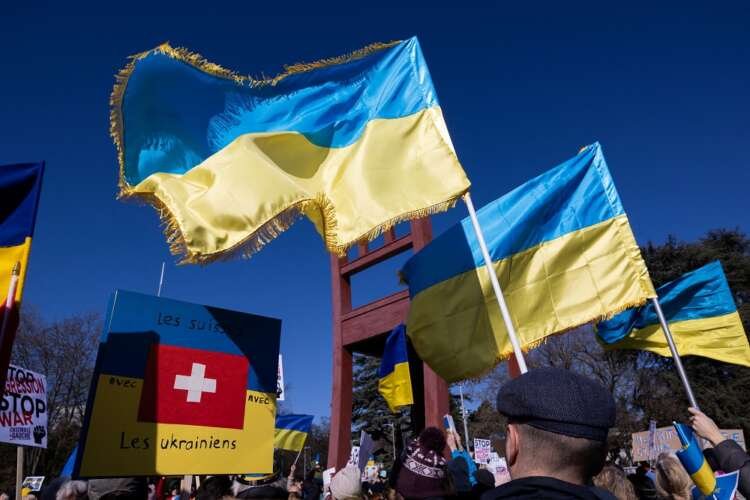 Protesters demonstrating in Geneva against Russian sanctions in support of Ukraine - Global Banking & Finance Review
