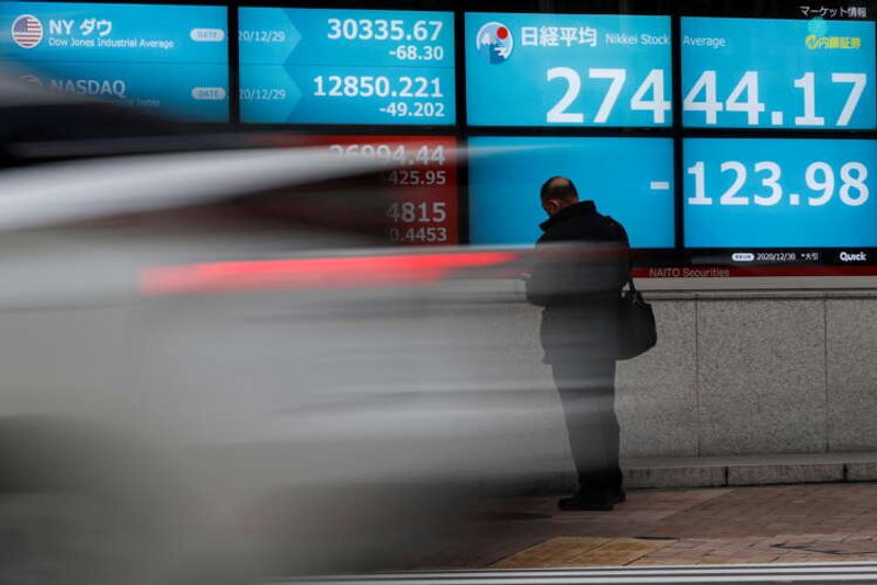 Image for World stocks near record high, U.S. bond yields near 1-month low