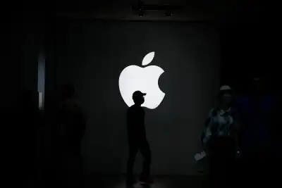 Image for Apple cuts about 100 digital services jobs, Bloomberg News reports