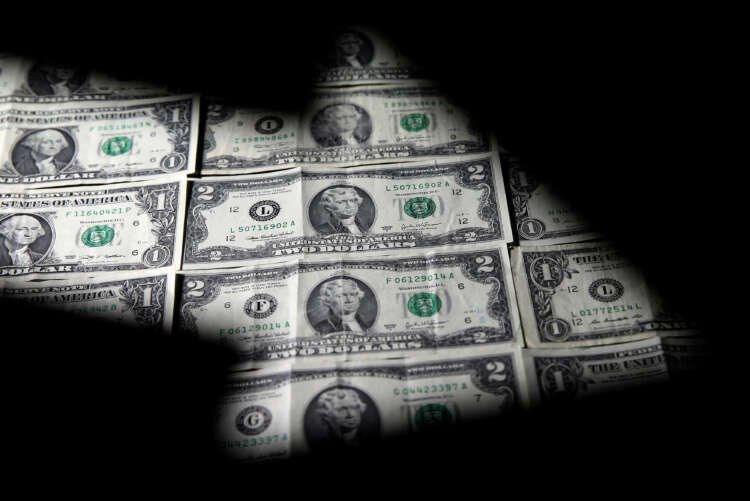 Image for Dollar skids after soft U.S. economic data; impact of OPEC+ cuts fades