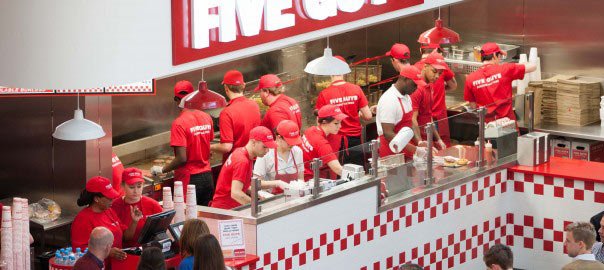 Five Guys staff using Creditcall's mPOS solution for fast customer payments - Global Banking & Finance Review