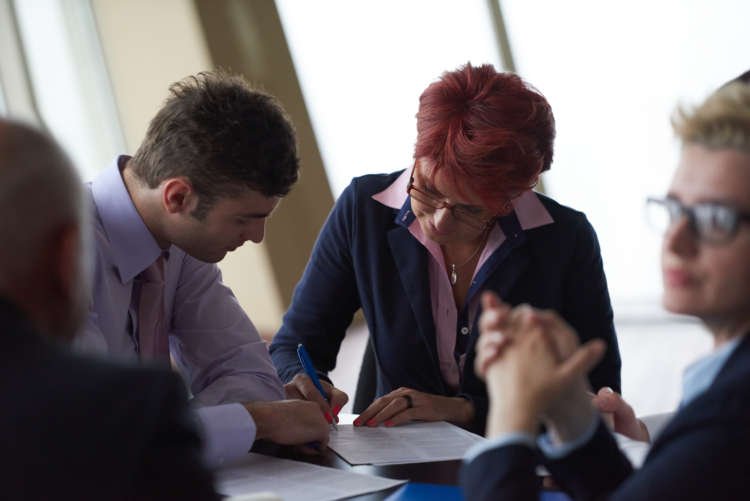 business people group sign contract