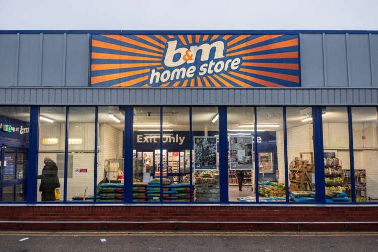 Exterior view of a B&M store showcasing budget-friendly goods during cost-of-living crisis - Global Banking & Finance Review
