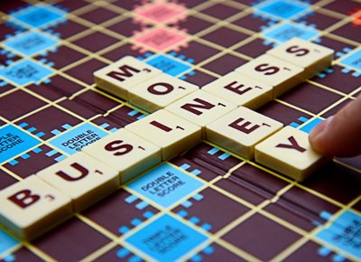 A worried individual reviewing hospital bills, emphasizing the burden of medical expenses - Global Banking & Finance Review