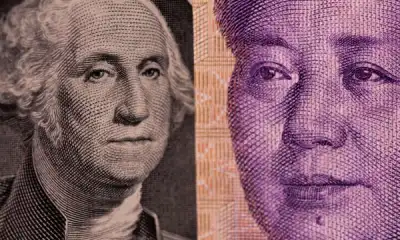 Image for Dollar rally pauses as Fed plays calm hand on inflation surprise