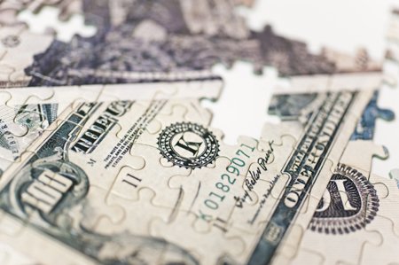 Illustration of banknotes in a puzzle, symbolizing tax complexities in EU finance - Global Banking & Finance Review