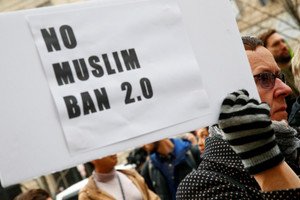 Protesters rally against Trump's Muslim travel ban executive order - Global Banking & Finance Review