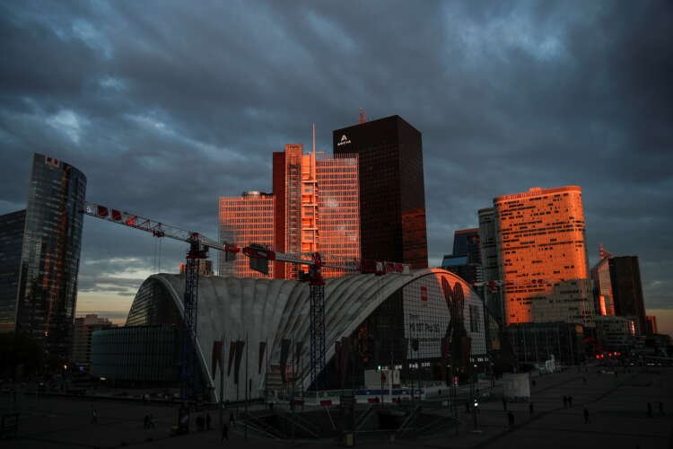 Paris skyline with financial institutions, symbolizing job growth due to Brexit - Global Banking & Finance Review