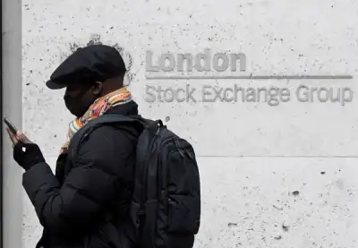 Image for UK shares fall as recovery worries hit bank, energy stocks